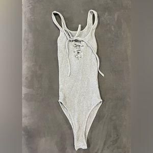 Tie front bodysuit. Size s.